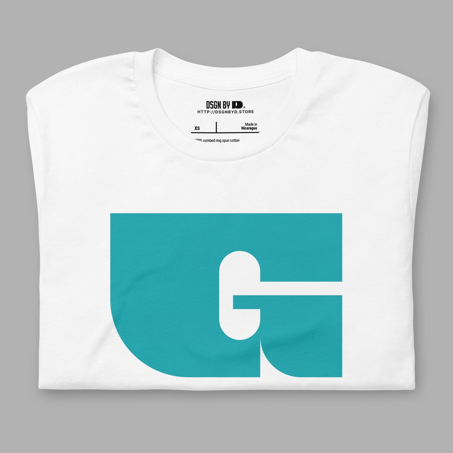A folded white cotton unisex graphic tee with letter G.