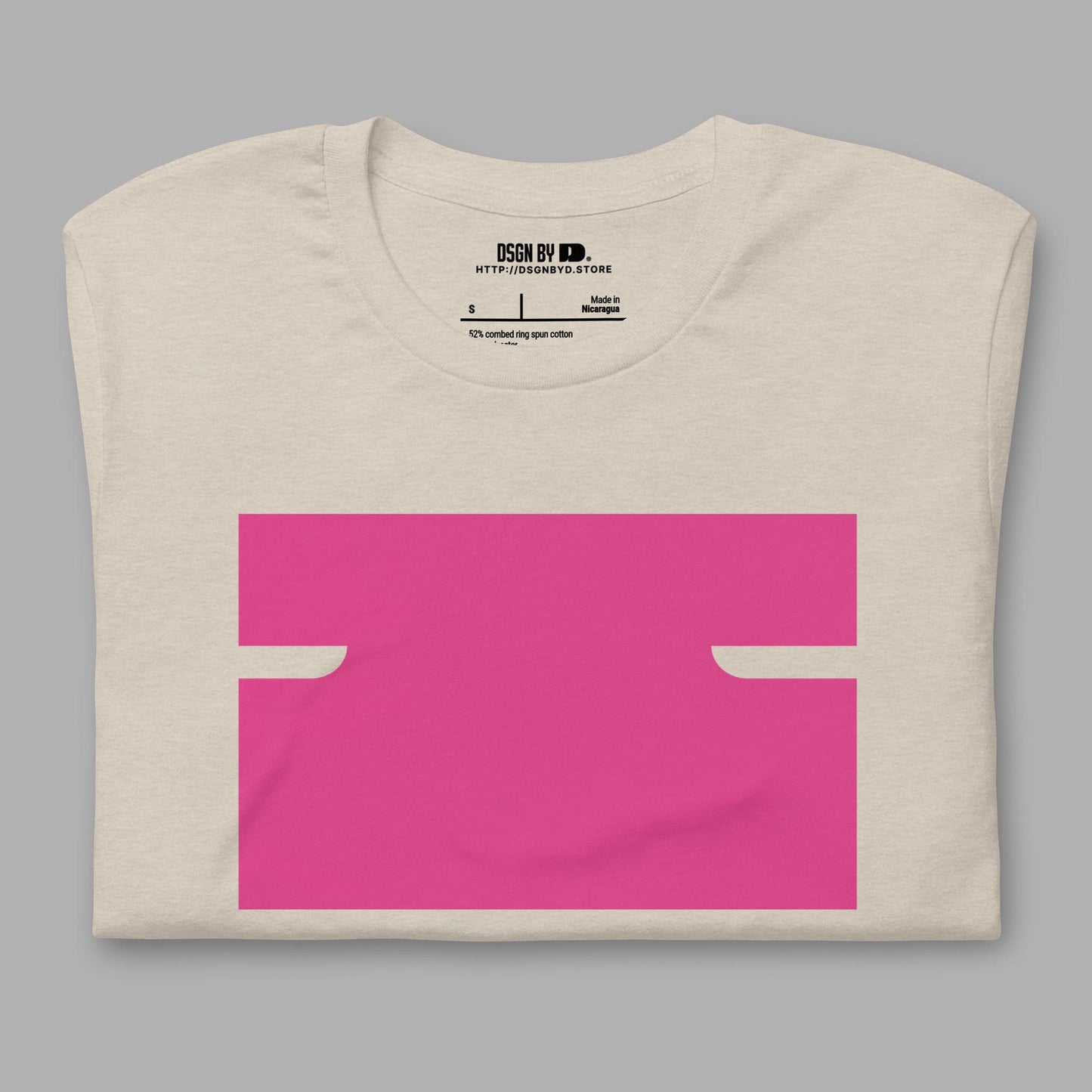 A folded beige cotton unisex graphic tee with letter I.