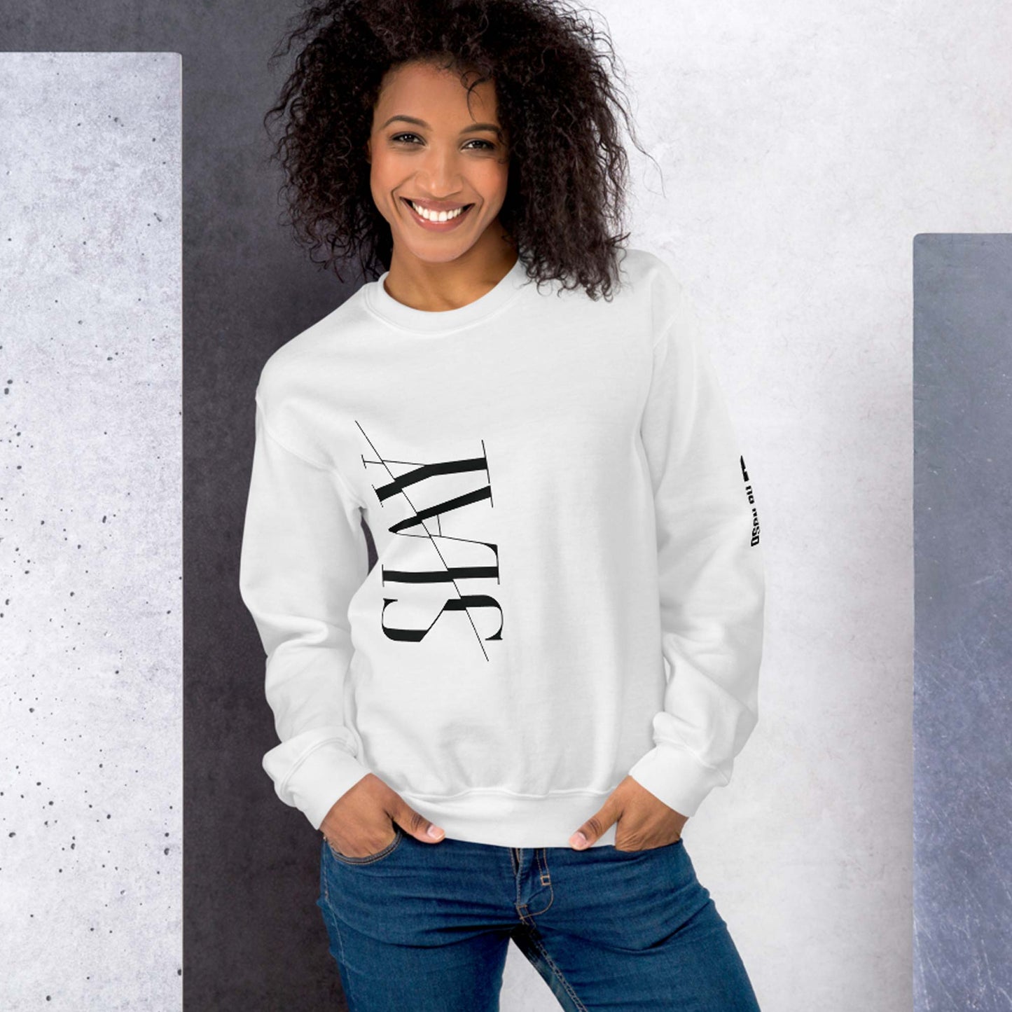 A woman wearing white unisex crew neck sweatshirt.