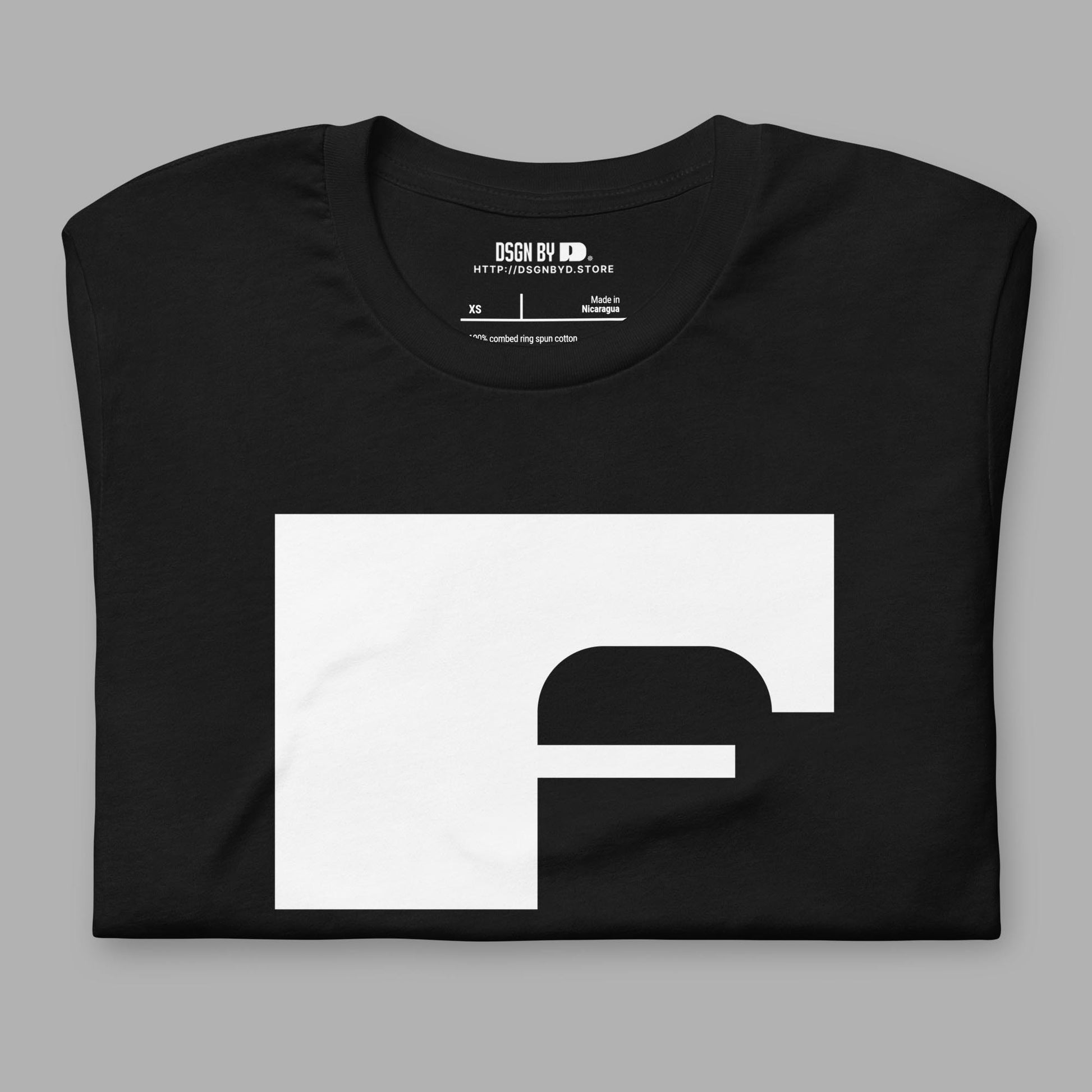 A folded black cotton unisex graphic tee with letter F.