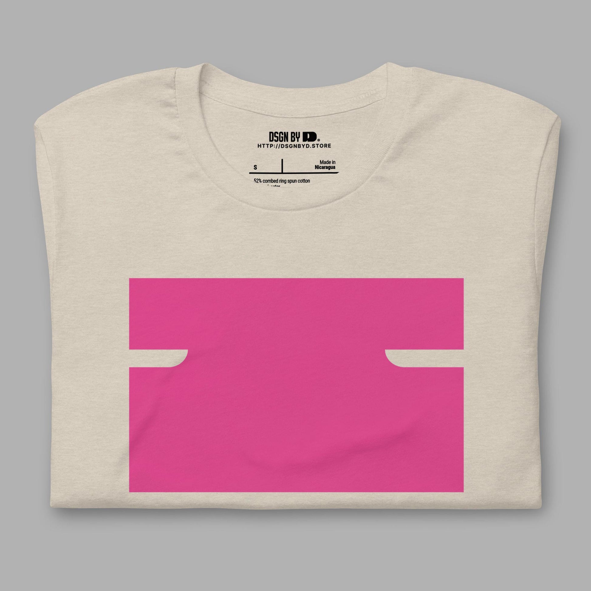 A folded beige cotton unisex graphic tee with letter I.