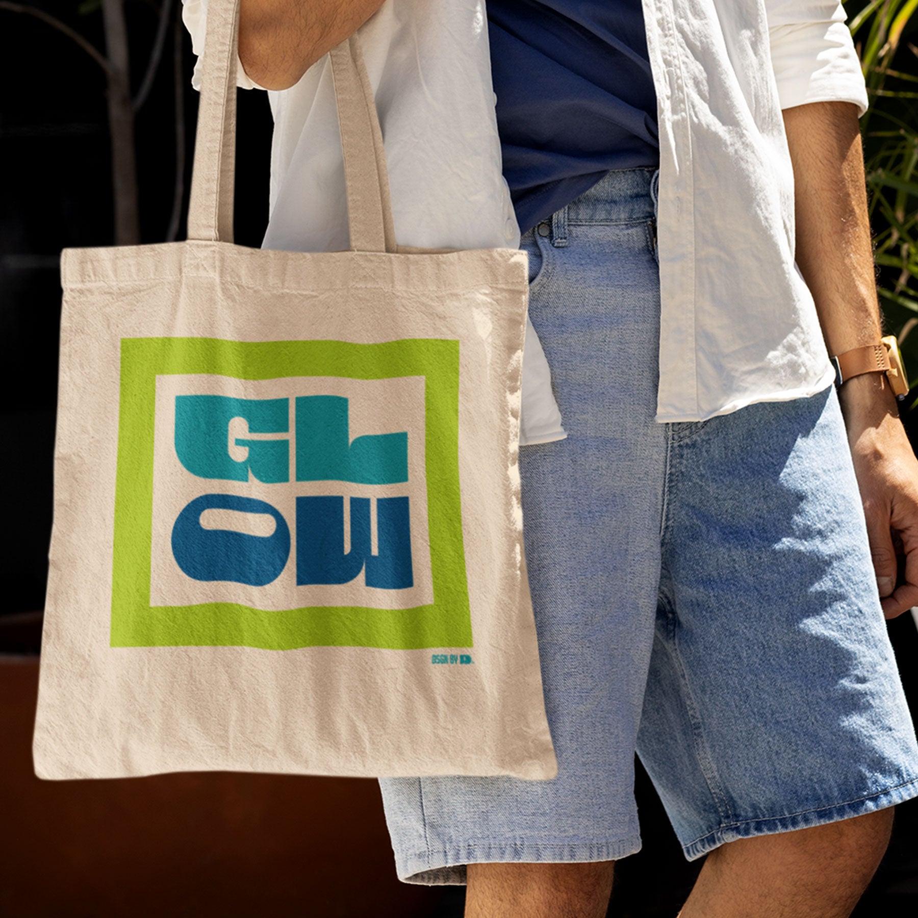 Man with cotton canvas tote bag.