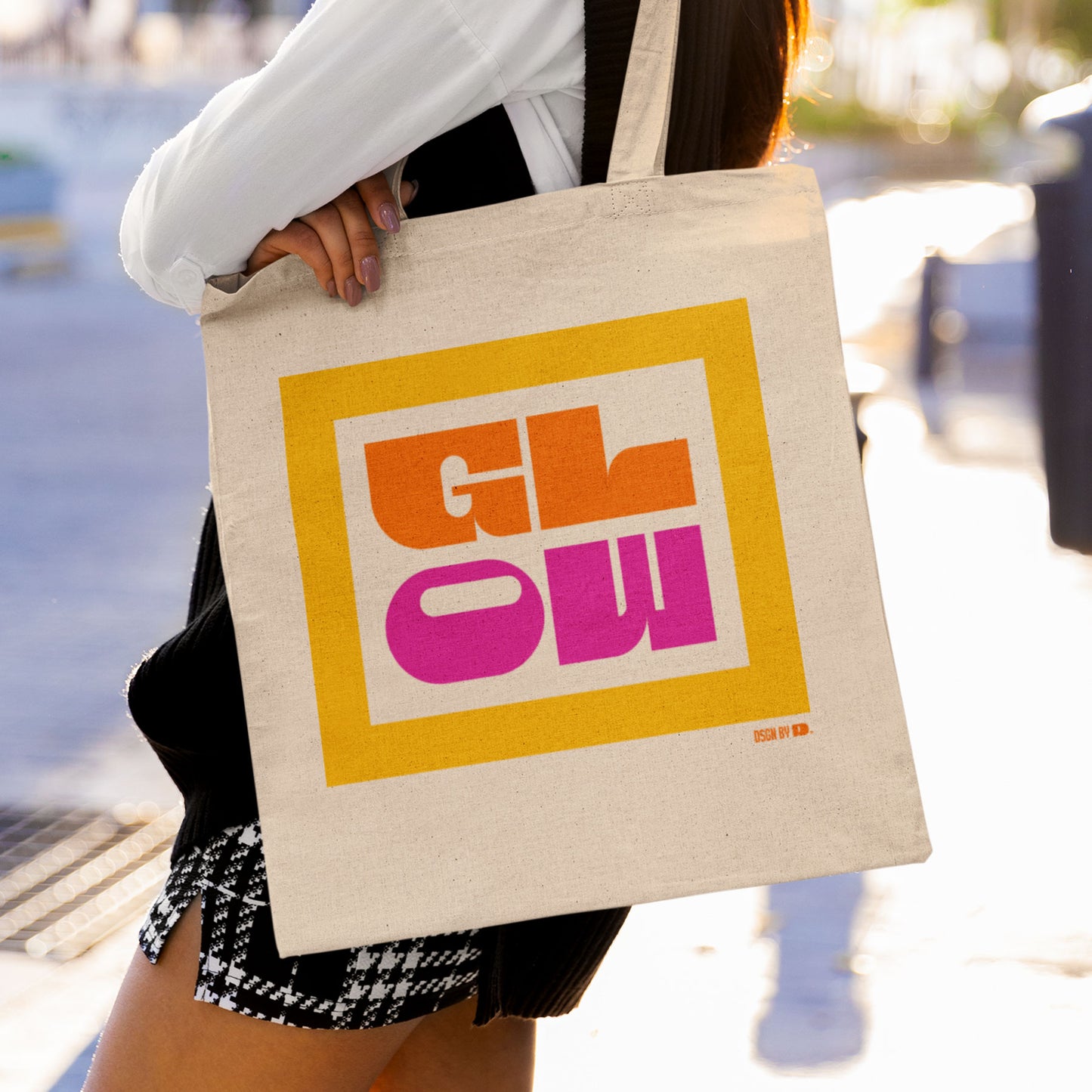 Woman carrying cotton canvas tote bag