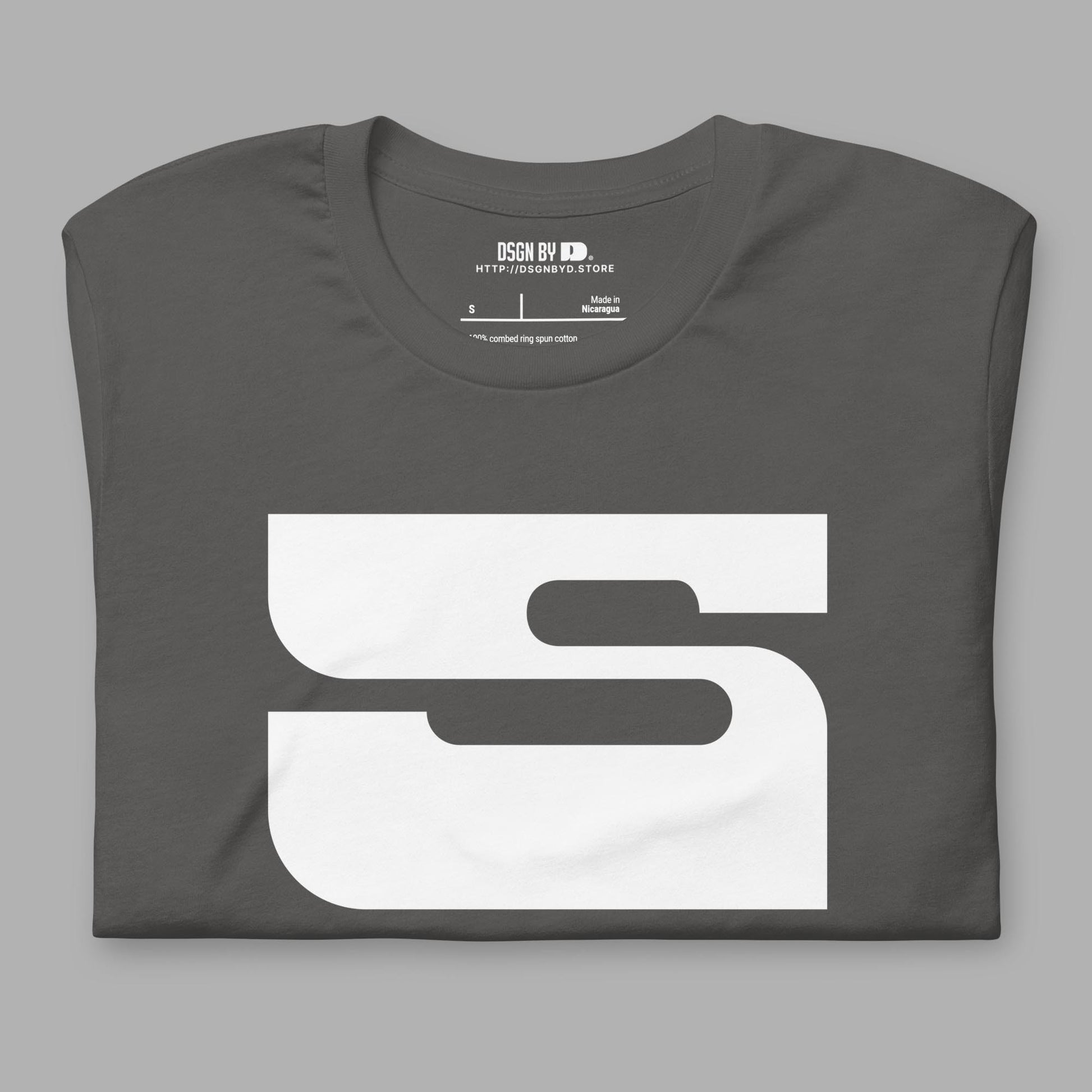 A folded grey cotton unisex graphic tee with letter S.
