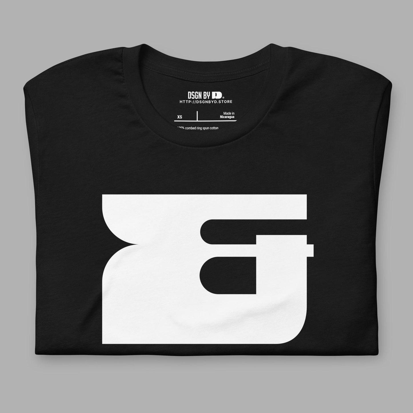 A folded black cotton unisex graphic tee.