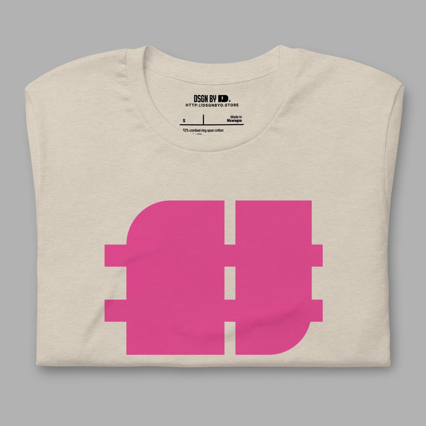 A folded beige cotton unisex graphic tee.