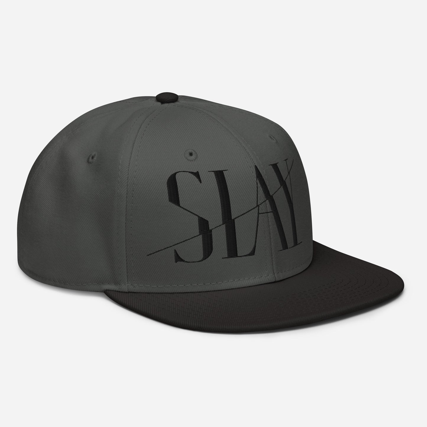 A black and grey Snapback Hat with the word "SLAY" embroidered on the front.