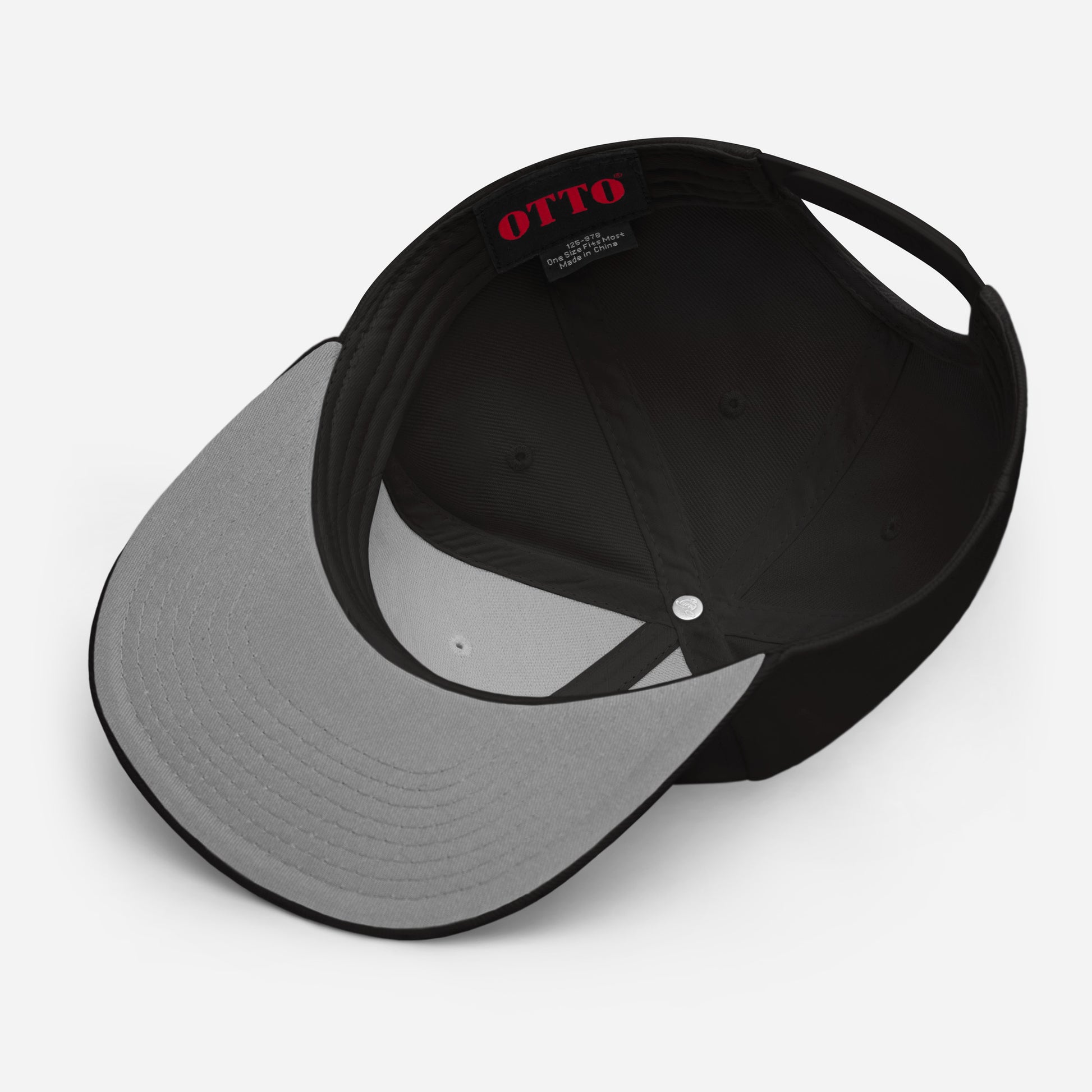 Flip side of a black Snapback Hat with the word "SLAY" embroidered on the front.